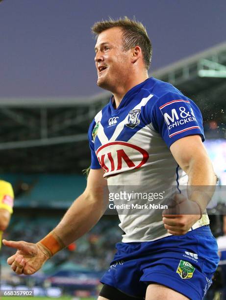 Josh Morris of the Bulldogs celebrates scoring a try during the round seven NRL match between the Canterbury Bulldogs and the South Sydney Rabbitohs...