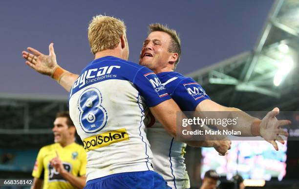 Josh Morris of the Bulldogs celebrates scoring a try during the round seven NRL match between the Canterbury Bulldogs and the South Sydney Rabbitohs...