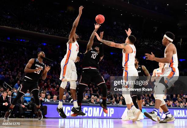 Duane Notice of the South Carolina Gamecocks attempts a shot against the Florida Gators during the second half of the 2017 NCAA Men's Basketball...