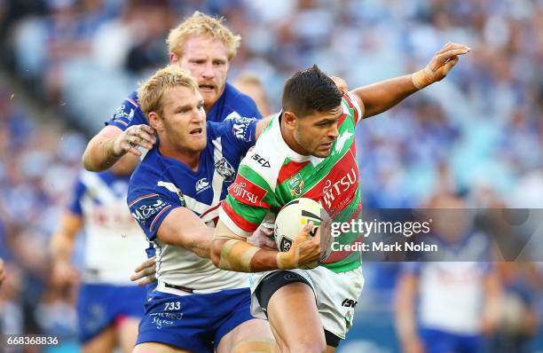 Braidon Burns of the Rabbitohs is tackled during the round seven NRL match between the Canterbury Bulldogs and the South Sydney Rabbitohs at ANZ...