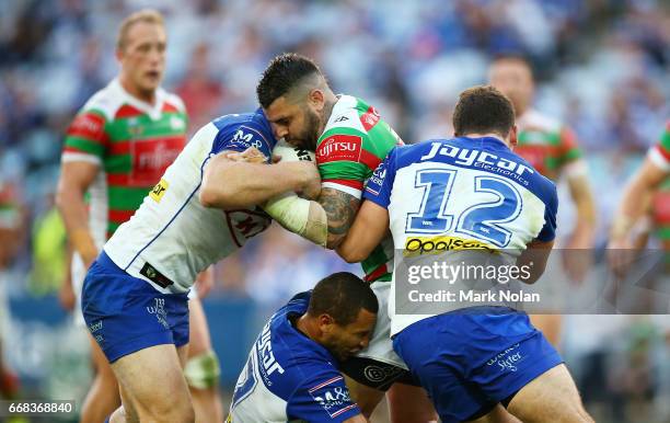 Adam Reynolds of the Rabbitohs is tackled during the round seven NRL match between the Canterbury Bulldogs and the South Sydney Rabbitohs at ANZ...