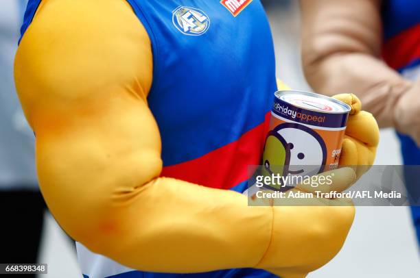 Bulldogs mascots collect money for the Good Friday Appeal during the 2017 AFL round 04 match between the North Melbourne Kangaroos and the Western...