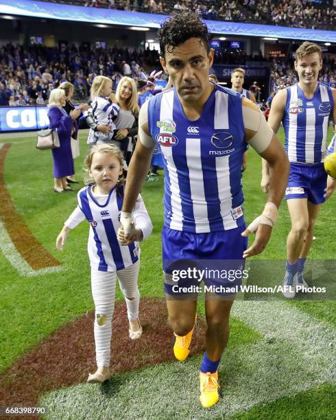 Lindsay Thomas of the Kangaroos with family for his 200th match during the 2017 AFL round 04 match between the North Melbourne Kangaroos and the...