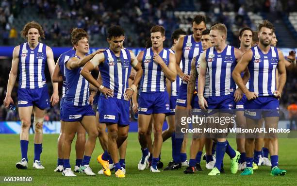 The Kangaroos look dejected after a loss during the 2017 AFL round 04 match between the North Melbourne Kangaroos and the Western Bulldogs at Etihad...