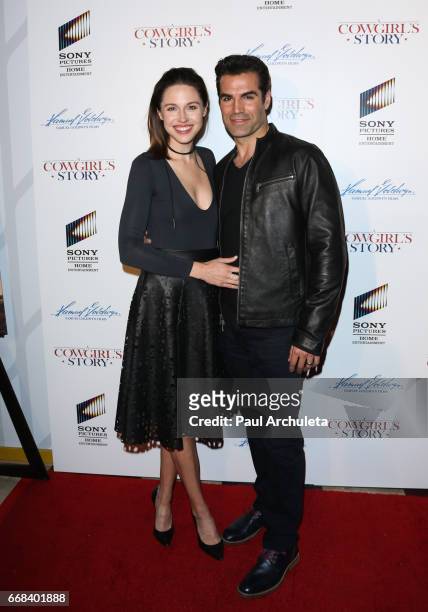 Actors Kaitlin Riley and Jordi Vilasuso attend the premiere of "A Cowgirl's Story" at Pacific Theatres at The Grove on April 13, 2017 in Los Angeles,...