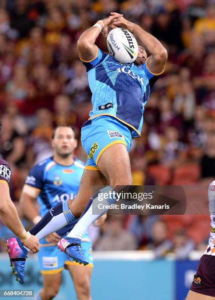 Tyronne Roberts-Davis of the Titans takes the high ball during the round seven NRL match between the Brisbane Broncos and the Gold Coast Titans at...