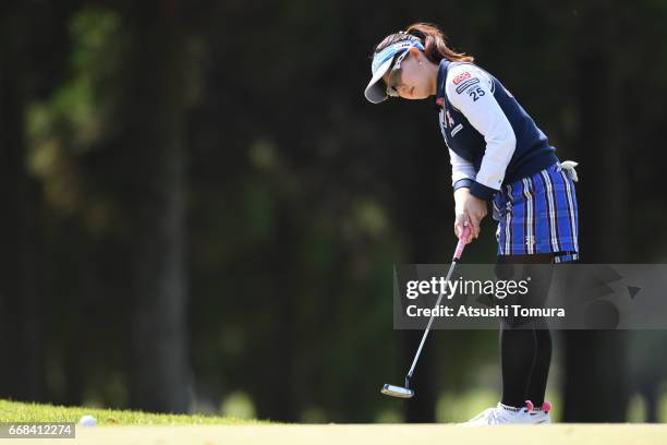 Kotono Kozuma of Japan putts on the 4th hole during the first round of the KKT Cup Vantelin Ladies Open at the Kumamoto Airport Country Club on April...