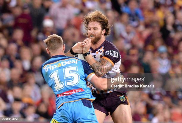 Korbin Sims of the Broncos takes on the defence during the round seven NRL match between the Brisbane Broncos and the Gold Coast Titans at Suncorp...