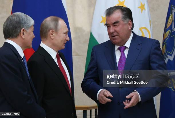 Russian President Vladimir Putin , Kyrgyz President Almazbek Atambayev and Tajik President Emomali Rakhmon attend the Summit of Collective Security...