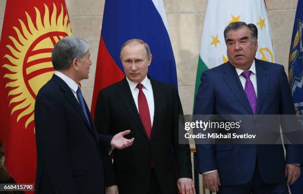 Russian President Vladimir Putin , Kyrgyz President Almazbek Atambayev and Tajik President Emomali Rakhmon attend the Summit of Collective Security...