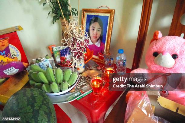 The portrait of Le Thi Nhat Linh, who was murdered last month, is seen after the arrest of the suspect on April 14, 2017 in Haiphong, Vietnam. Le...