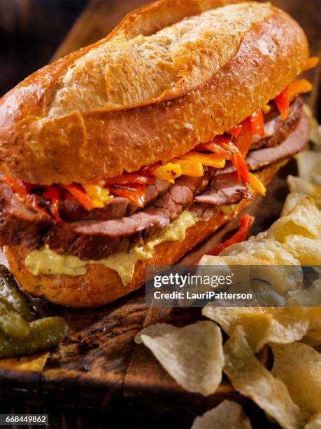 roast beef sandwich with roasted peppers - spit roasted stock pictures, royalty-free photos & images