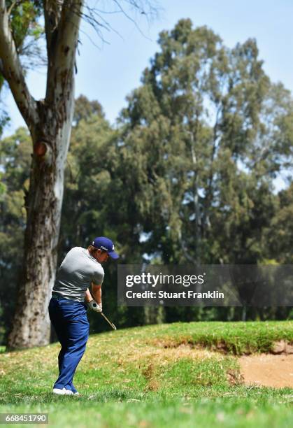 Paul Dunne of Ireland plays from the rough during day 2 of the Trophee Hassan II at Royal Golf Dar Es Salam on April 14, 2017 in Rabat, Morocco.