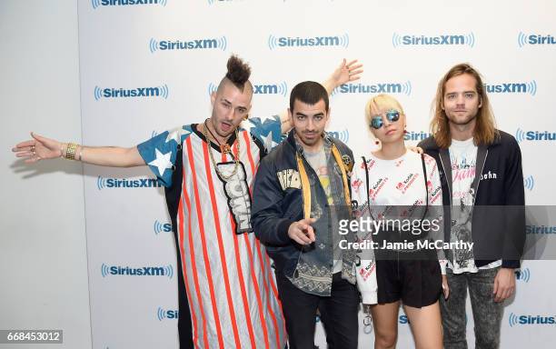 Cole Whittle, Joe Jonas, JinJoo Lee, and Jack Lawless of music group DNCE visit SiriusXM Studios on April 14, 2017 in New York City.