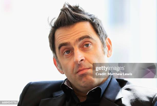 Ronnie O'Sullivan of England looks on during a media day ahead of the World Snooker Championships at Crucible Theatre on April 14, 2017 in Sheffield,...