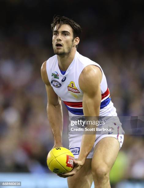 Easton Wood of the Bulldogs runs with the ball during the round four AFL match between the North Melbourne Kangaroos and the Western Bulldogs at...