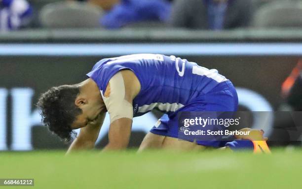 Lindsay Thomas of the Kangaroos reacts on the final siren during the round four AFL match between the North Melbourne Kangaroos and the Western...