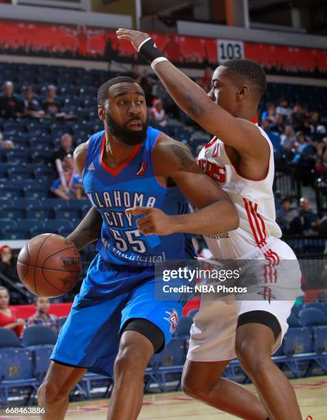 April 13: Reggie Williams of the Oklahoma City Blue dribbles the ball around Isaiah Taylor of the Rio Grande Valley Vipers during the first game of...