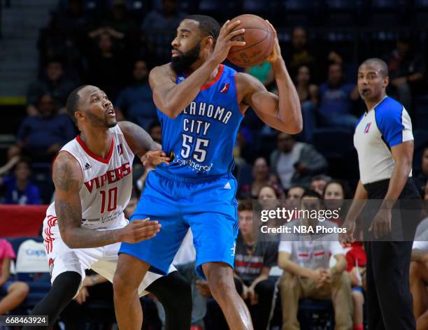 April 13: Reggie Williams of the Oklahoma City Blue looks for a pass as Chris Johnson of the Rio Grande Valley Vipers defends during the first game...