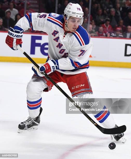 Brady Skjei of the New York Rangers controls the puck against the Montreal Canadiens in Game One of the Eastern Conference Quarterfinals during the...