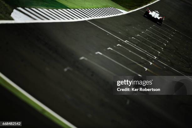 The Porsche LMP Team 919 Hybrid of Neel Jani, Andre Lotterer and Nick Tandy drives during practice for the FIA World Endurance Championship at...