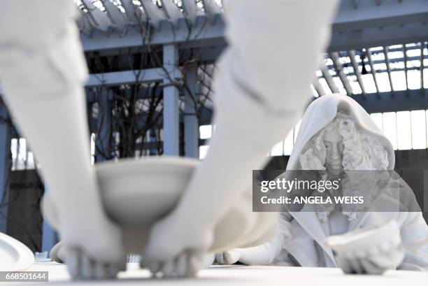 Sculptures of "The Roof Garden Commission: Adrian Villar Rojas, The Theater of Disappearance" are seen at the Metropolitan Museum of Art on April 14,...