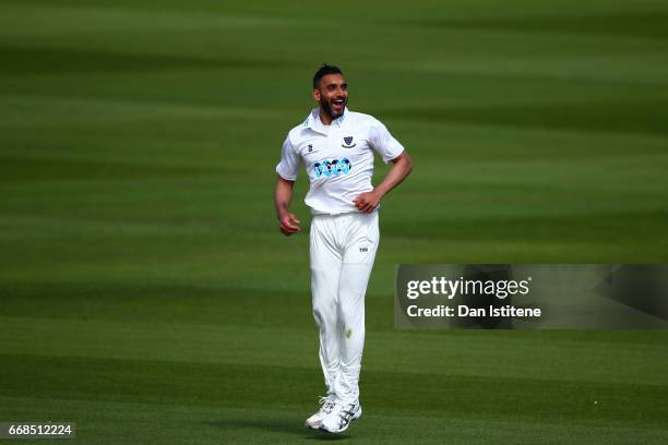 Ajmal Shahzad of Sussex celebrates after claiming the wicket of Sam Northeast of Kent during day one of the Specsavers County Championship Division...