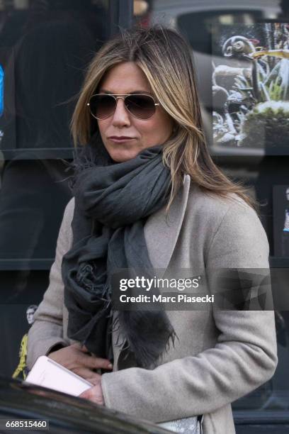 Actress Jennifer Aniston is seen leaving the 'Dries Van Noten' store on April 14, 2017 in Paris, France.