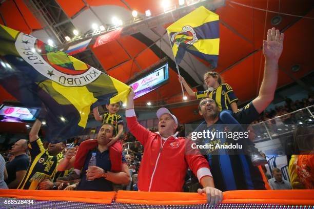 Fans of Fenerbahce wave flags during FIBA Women's EuroLeague semi final's first leg match between Fenerbahce and UMMC Ekaterinburg at DIVS Sport Hall...