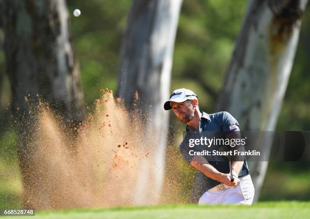 Gregory Bourdy of France plays from a bunker during day 2 of the Trophee Hassan II at Royal Golf Dar Es Salam on April 14, 2017 in Rabat, Morocco.