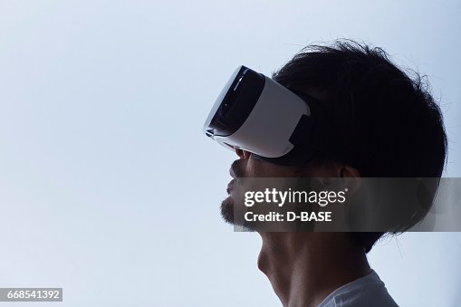 Human Using Virtual Headset Man Using A Virtual Reality Headset High-Res Stock Photo - Getty Images