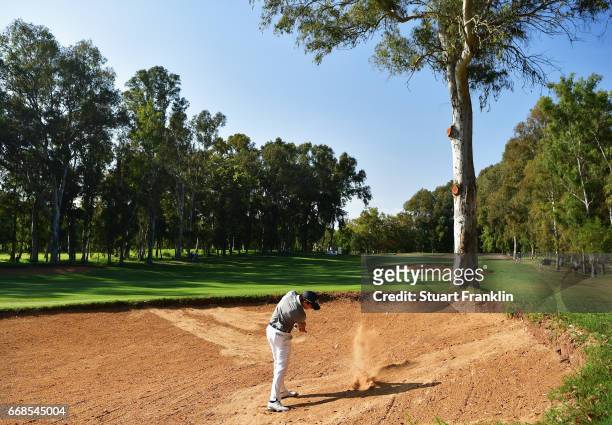 Matteo Manassero of Italy plays from a bunker during day 2 of the Trophee Hassan II at Royal Golf Dar Es Salam on April 14, 2017 in Rabat, Morocco.