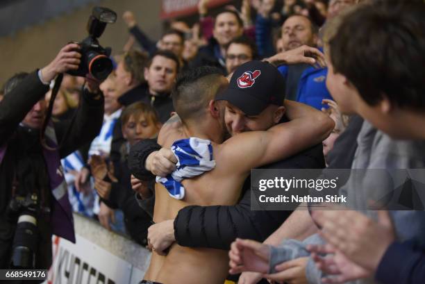 Anthony Knockaert of Brighton & Hove Albion gives his shirt to a fan during the Sky Bet Championship match between Wolverhampton Wanderers and...