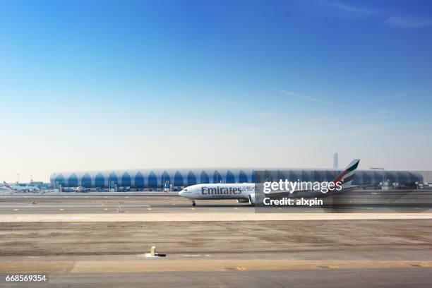 aeroporto internacional de dubai - dubai international airport - fotografias e filmes do acervo