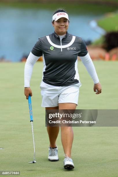 Ariya Jutanugarn of Thailand reactrs to a putt on the eighth green during the first round of the LPGA LOTTE Championship Presented By Hershey at Ko...