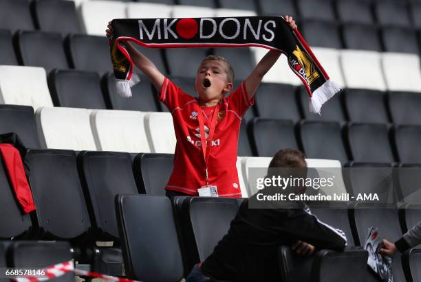 Dons fanswith a scarf during the Sky Bet League One match between MK Dons and Scunthorpe United at StadiumMK on April 14, 2017 in Milton Keynes,...