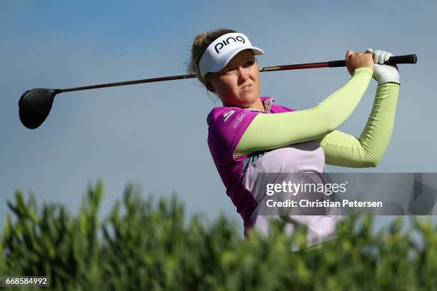 Brooke M. Henderson of Canada plays a te shot on the 13th hole during the first round of the LPGA LOTTE Championship Presented By Hershey at Ko Olina...