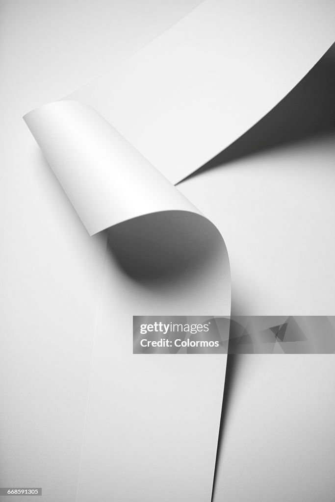 Detail shot of wavy paper and shadow