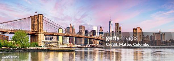 lower manhattan skyline panorama, new york, usa - new york city sunrise stock pictures, royalty-free photos & images