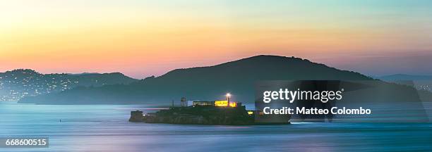 alcatraz island at sunset, san francisco - alcatraz stock pictures, royalty-free photos & images