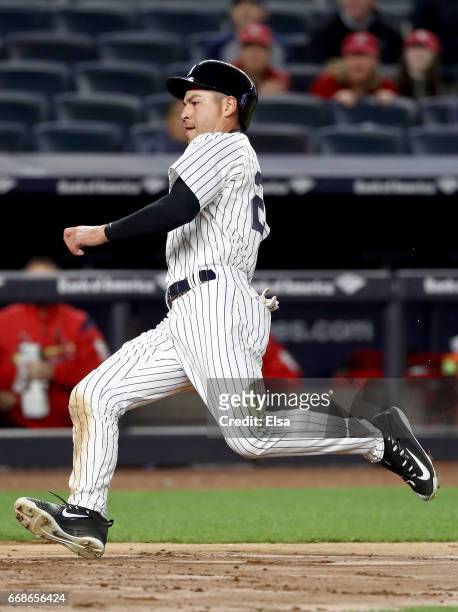 Jacoby Ellsbury of the New York Yankees scores the game winning run in the seventh inning against the St. Louis Cardinals on April 14, 2017 at Yankee...