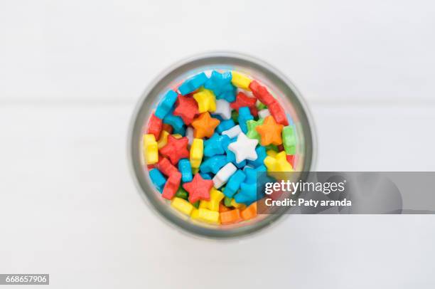 candies in a little bowl - dulces stock pictures, royalty-free photos & images