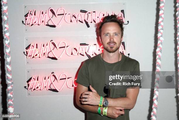 Actor Aaron Paul attends H&M Loves Coachella Tent during day 1 of the Coachella Valley Music & Arts Festival at the Empire Polo Club on April 14,...