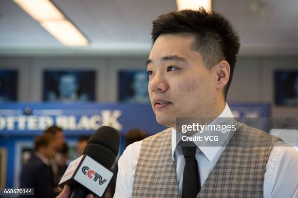 Ding Junhui of China talks to the media during a media day ahead of the World Snooker Championships at Crucible Theatre on April 14, 2017 in...