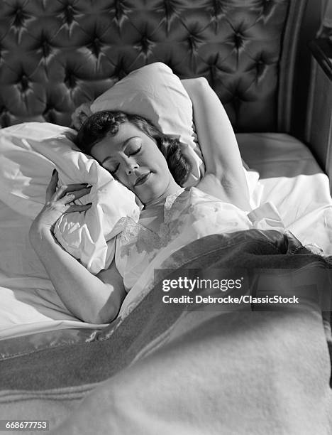 1940s 1950s WOMAN ASLEEP IN BED