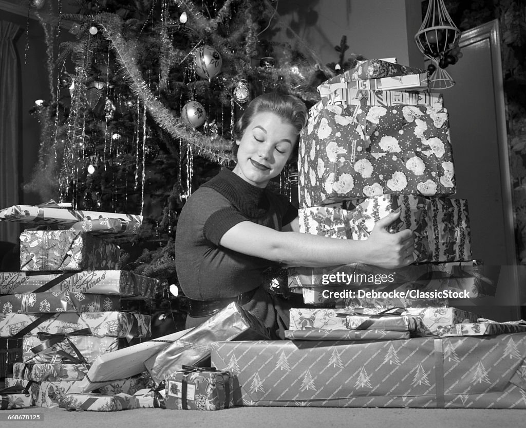 1950s WOMAN SITTING BY...