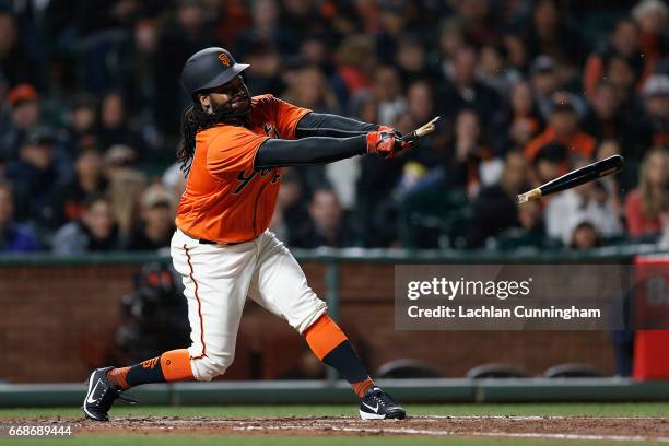 Johnny Cueto of the San Francisco Giants breaks his bat while at bat in the fourth inning against the Colorado Rockies at AT&T Park on April 14, 2017...