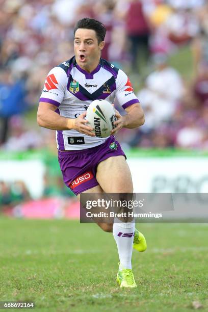 Cooper Cronk of the Storm runs the ball during the round seven NRL match between the Manly Sea Eagles and the Melbourne Storm at Lottoland on April...