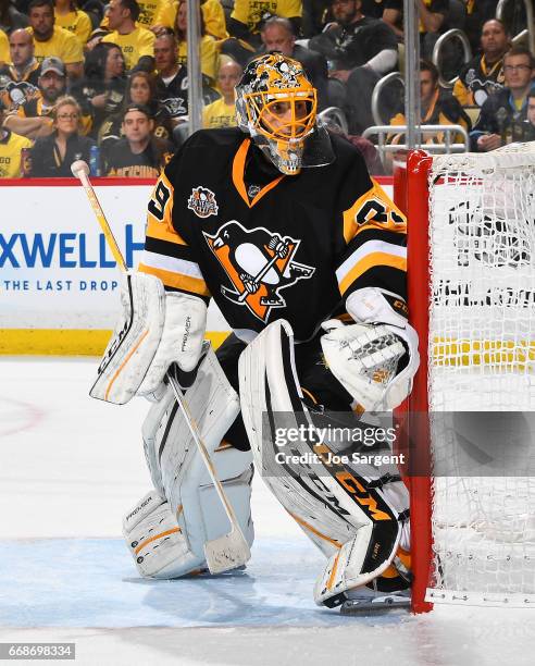 Marc-Andre Fleury of the Pittsburgh Penguins defends the net against the Columbus Blue Jackets in Game One of the Eastern Conference First Round...