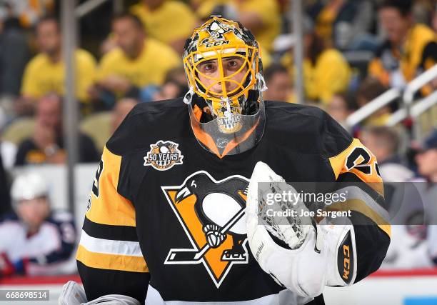 Marc-Andre Fleury of the Pittsburgh Penguins looks on against the Columbus Blue Jackets in Game One of the Eastern Conference First Round during the...